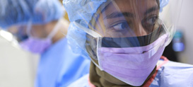 A graduate student in the Infectious Disease program at Drexel University College of Medicine working in the laboratory.
