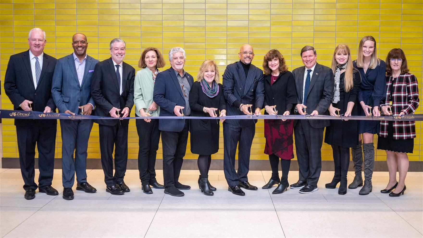 A mix of Drexel, Wexford and Ventas personnel cutting a ribbon. 