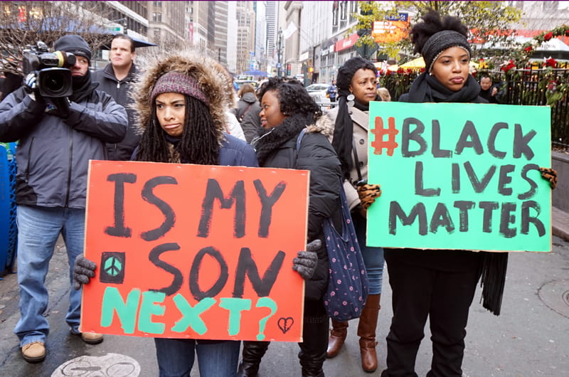 Protestors carrying placards at a Black Lives Matter demonstration in New York City in Nov. 2014.