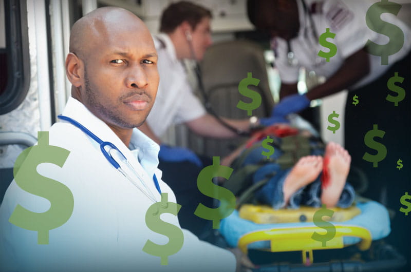 A doctor stands by ready to help as paramedics assist a patient on an ambulance.