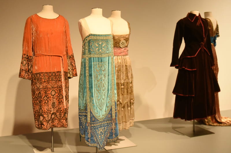 This teal Callot Soeurs evening dress c. 1926 (center) was a gift of Mr. Alexander J. Cassatt. Photo by Kelly & Massa Photography. 