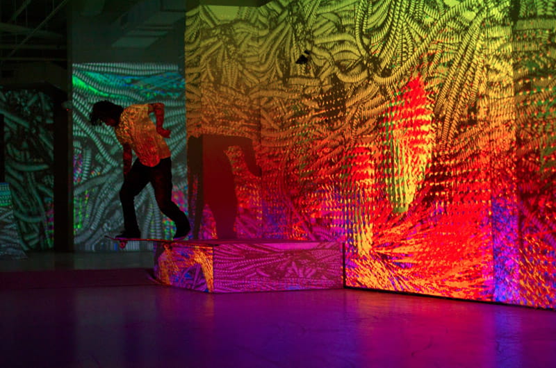 The site-specific pop-up skate park installation features an immersive, motion responsive projection. 
