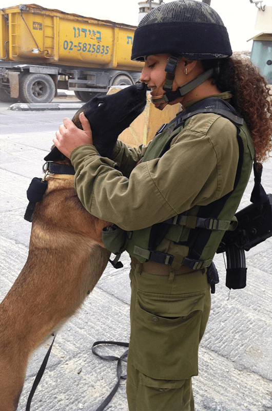 Shoval Dorani and Gula share a moment between patrols