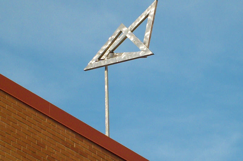 "Two Open Triangles Leaning Gyratory" by George Rickey.