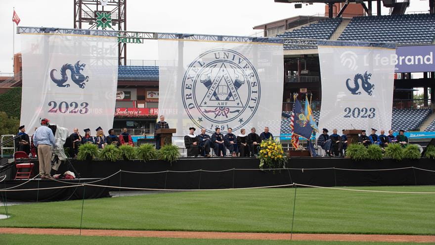 Speakers on stage at Drexel's 2023 Commencement