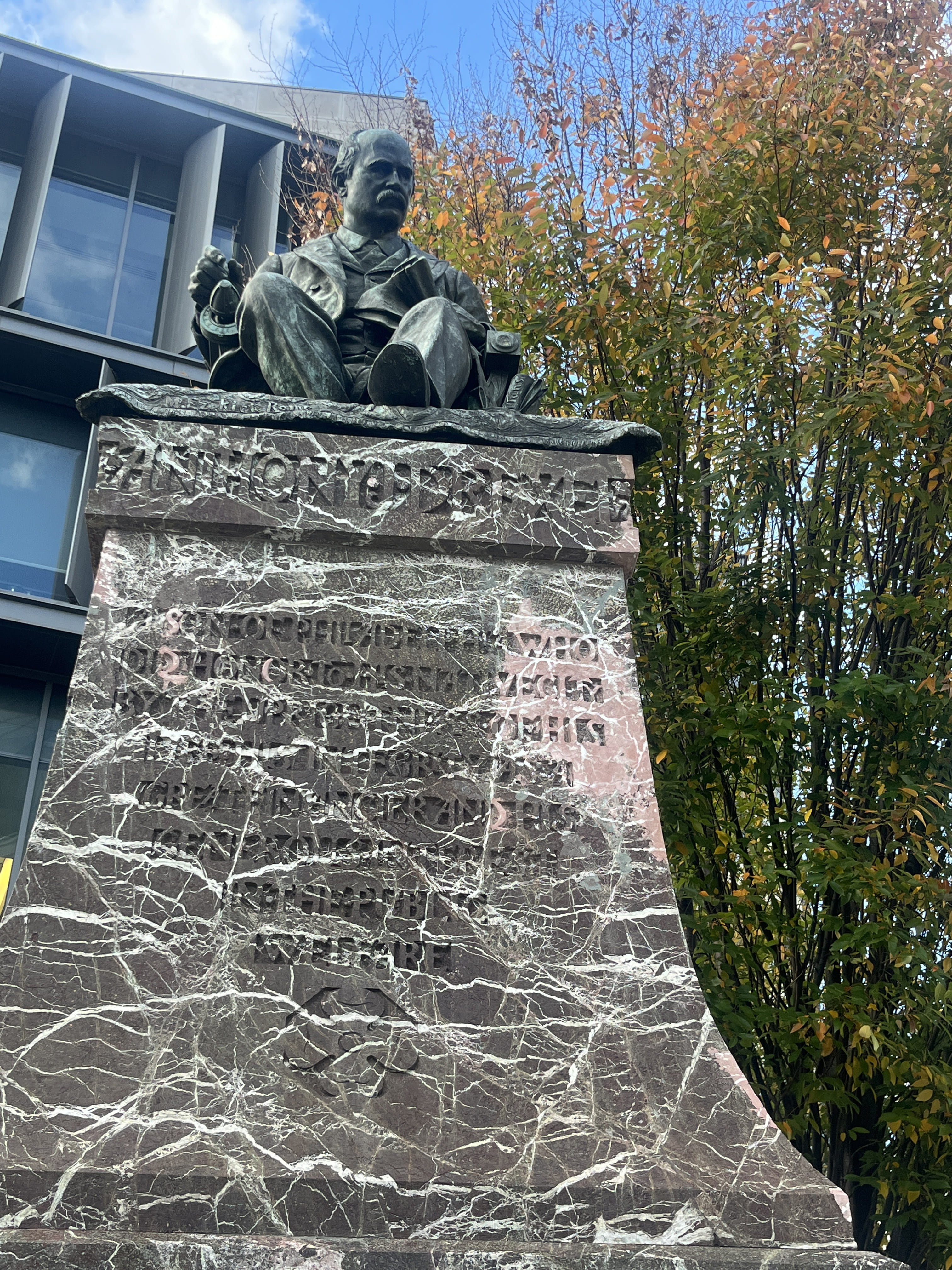 A closer look at the Anthony J. Drexel statue, including the papers held in Anthony’s left hand and the rug his chair is placed on. The statue is pictured at its current location outside of Gerri C. LeBow Hall on Market Street.