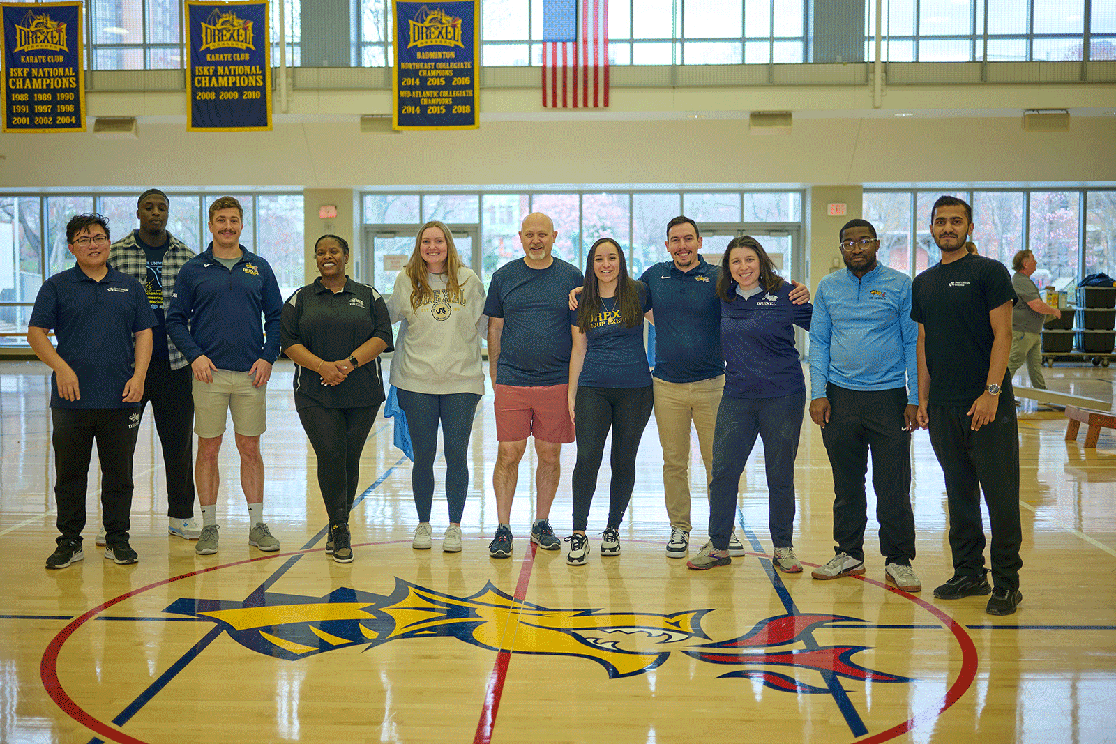 A GIF of photos of participants at this year's employee olympics, including group shots, high-fives, and people playing baggo and pickleball.