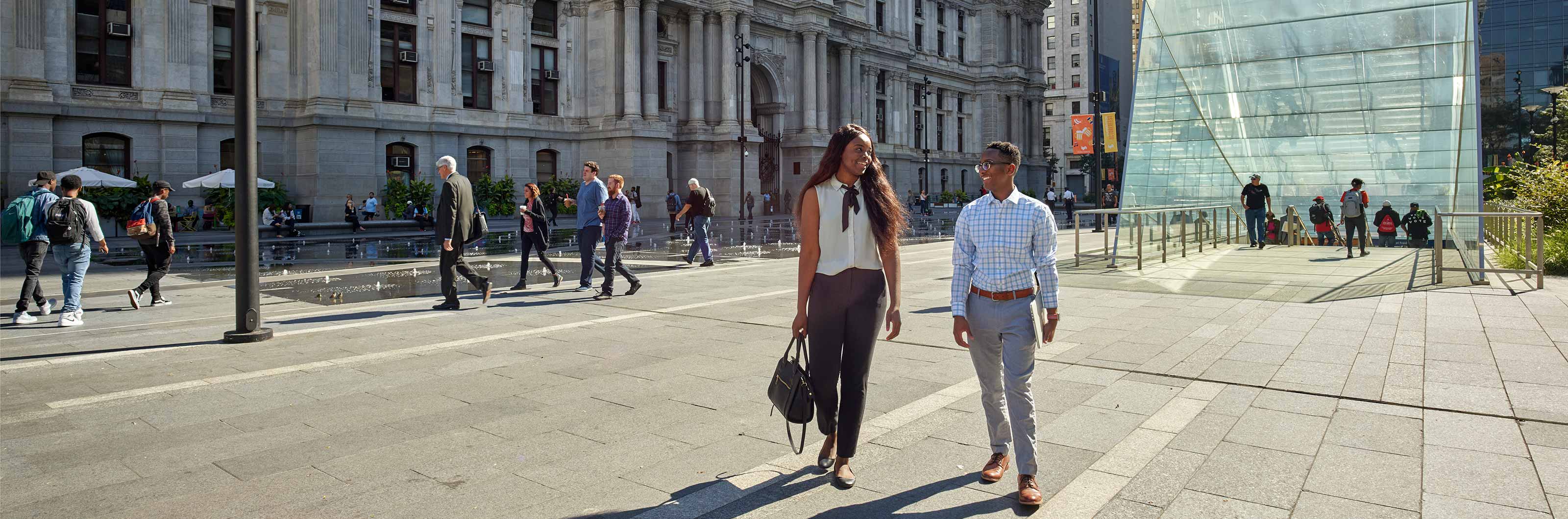 People walking in Dilworth Park