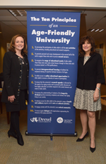 Dean with Age-Friendly Banner