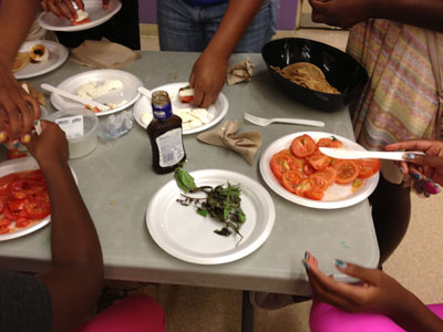 Mary Green & kids 11th Street cooking