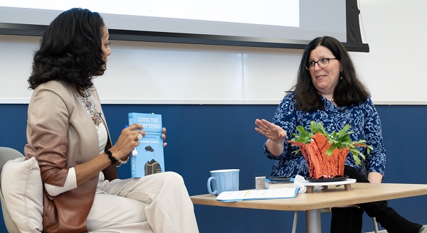 Veronica Carey, PhD, assistant dean for Diversity, Equity and Inclusion (seated on the left) and Marybeth Gasman, PhD, author of Doing the Right Thing: How Colleges and Universities Can Undo Systemic Racism in Faculty Hiring (seated on the right) having a discussion about Gasman's book.