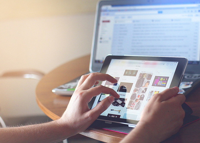 user completing a study on tablet