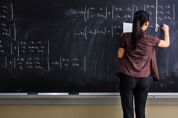 girl at blackboard