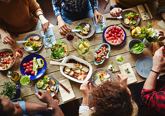 People eating healthy food at a table
