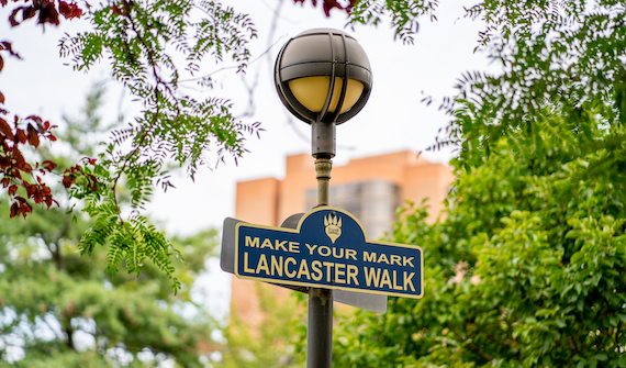Sign on Drexel campus reads "Make your mark"
