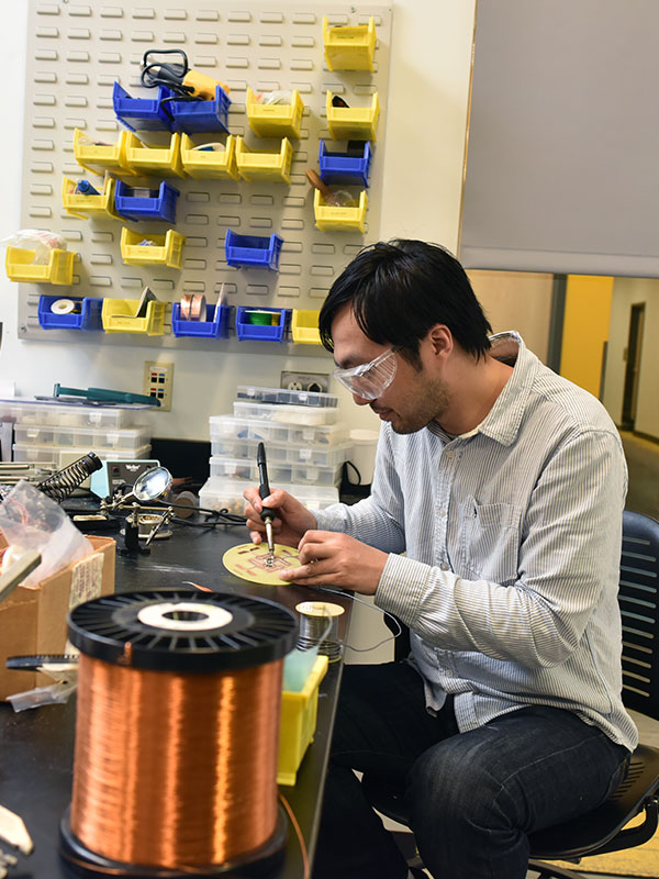 Student working with electrical components