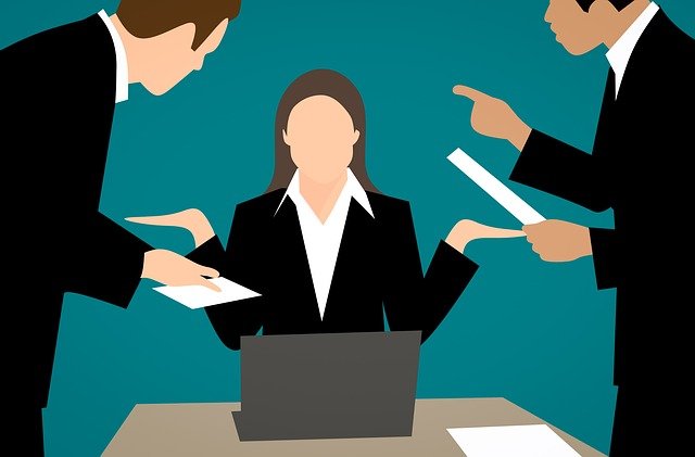 illustrated image of a women sitting at a desk with men giving her more work to accomplish