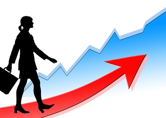 Illustrated image of a woman climbing the corporate ladder.