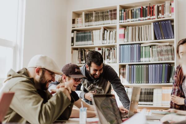 group laughing at work