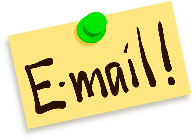 A sticky note with the word "e-mail" written on it.