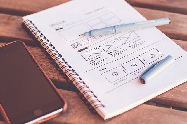 Image of a notebook with a design sketched out in pen