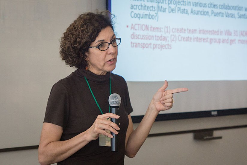 Ana Diez Roux speaking with a microphone