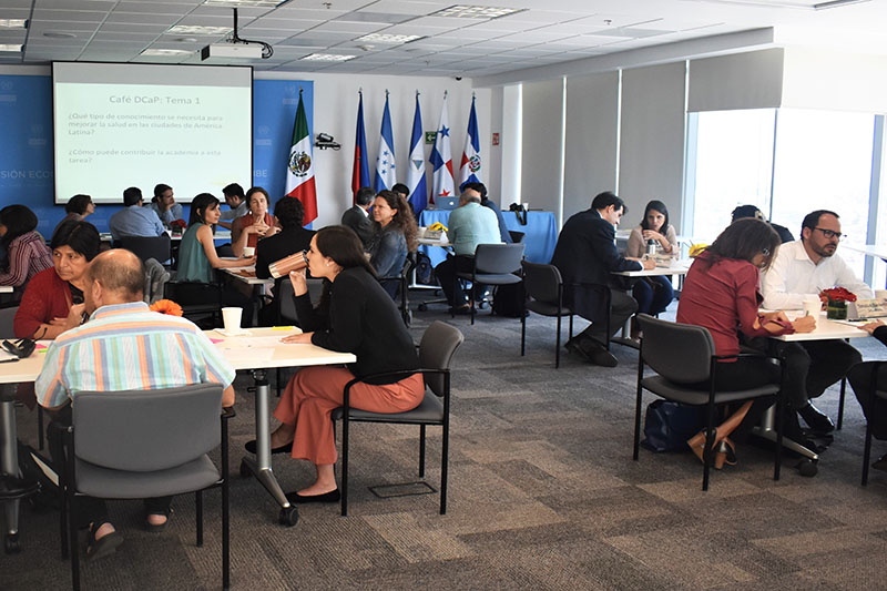 Participants working in groups at the Knowledge-to-Policy 