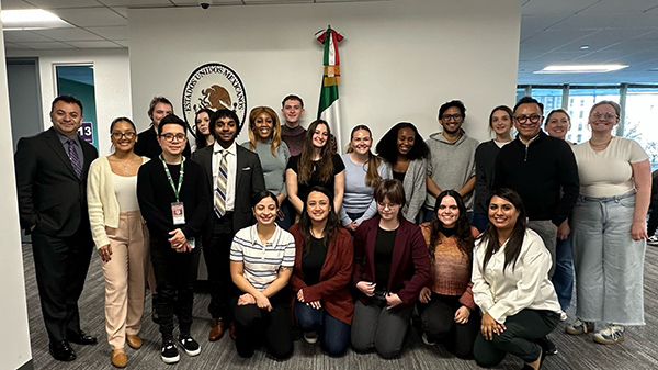 A group of student and faculty volunteers gather for a photo at the Mexican Consulate in Philadelphia.