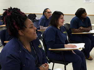 Drexel staff at the monthly Staff Grand Rounds.