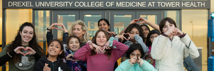 Students and faculty at the College of Medicine participate in several outreach projects.