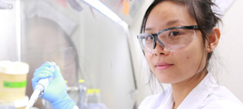 Drexel biochemistry graduate student in a lab.