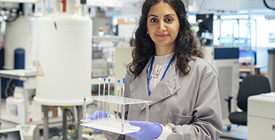 Clinical researcher working in lab.