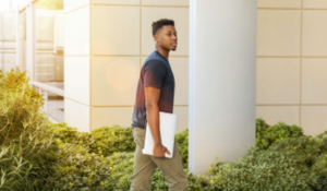 Student entering building.
