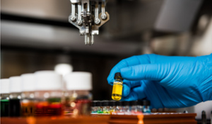 Technician working with samples in a lab.