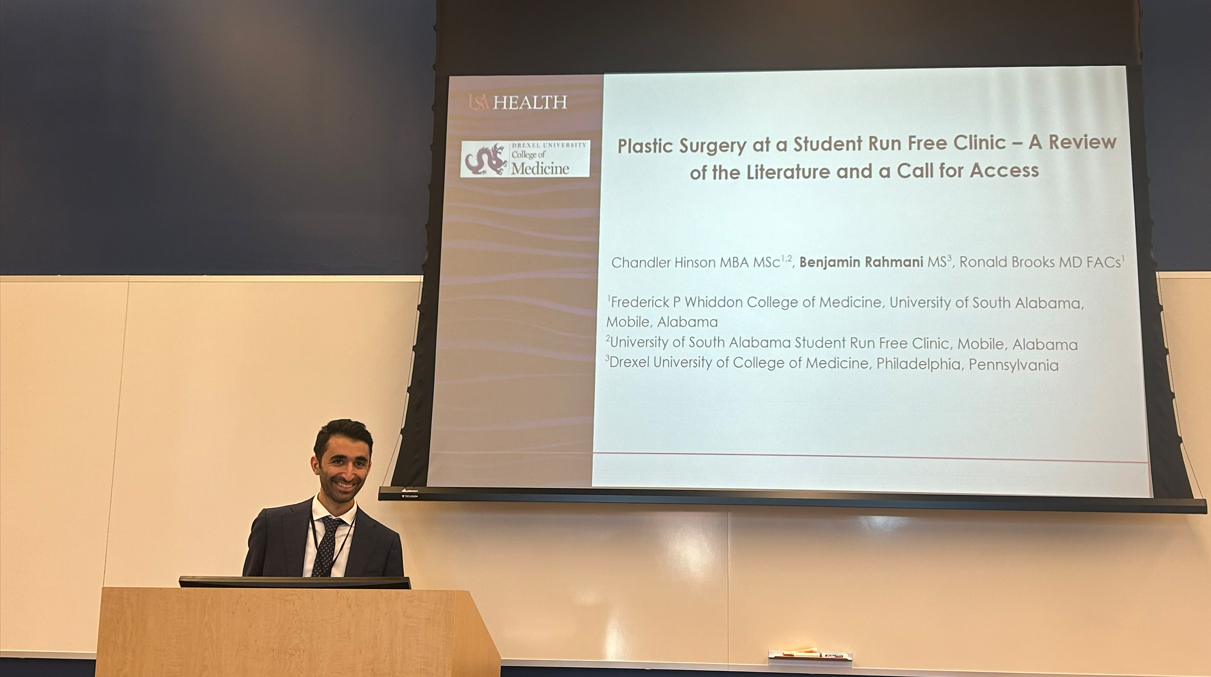 MD student Benjamin Rahamani presents his HOP team's work at the conference.