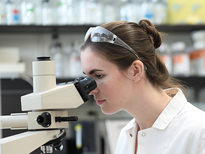 A Cancer Biology program graduate student working in the lab at Drexel University College of Medicine.
