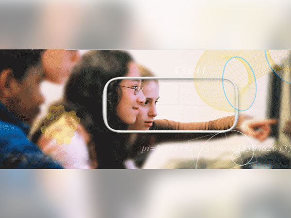 two female math students with computer screen