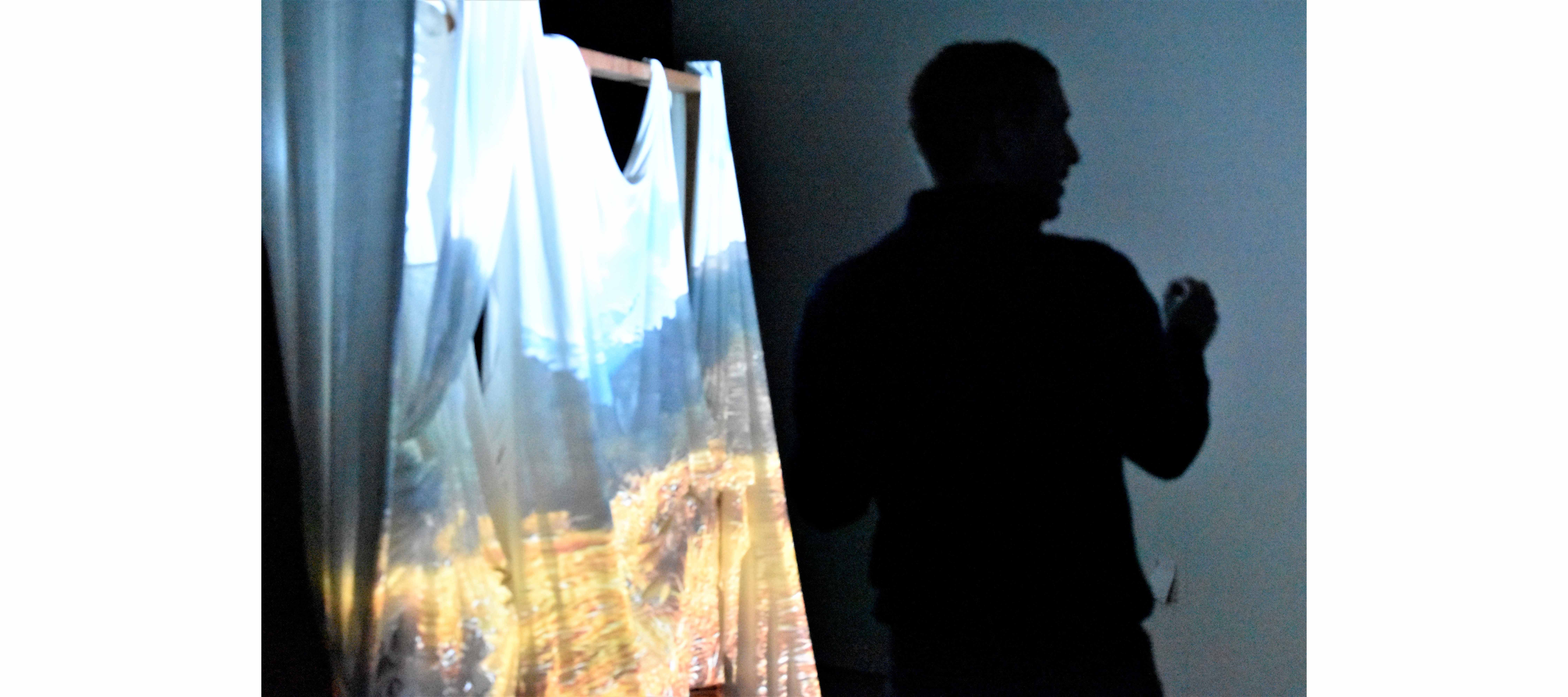 Professor William Mangold critiquing student work in Multimedia: Space/Time